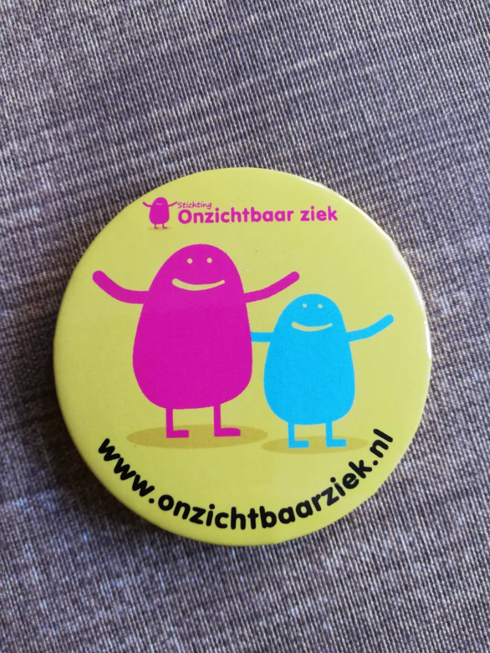 Button, Onzi's 56mm